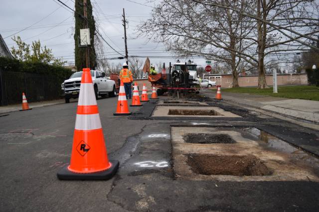 After — controlled work zone with cones and signage